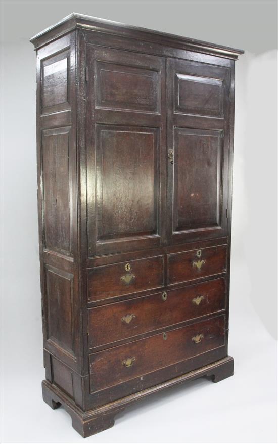 A George III oak press cupboard, W.3ft 10in. H.7ft